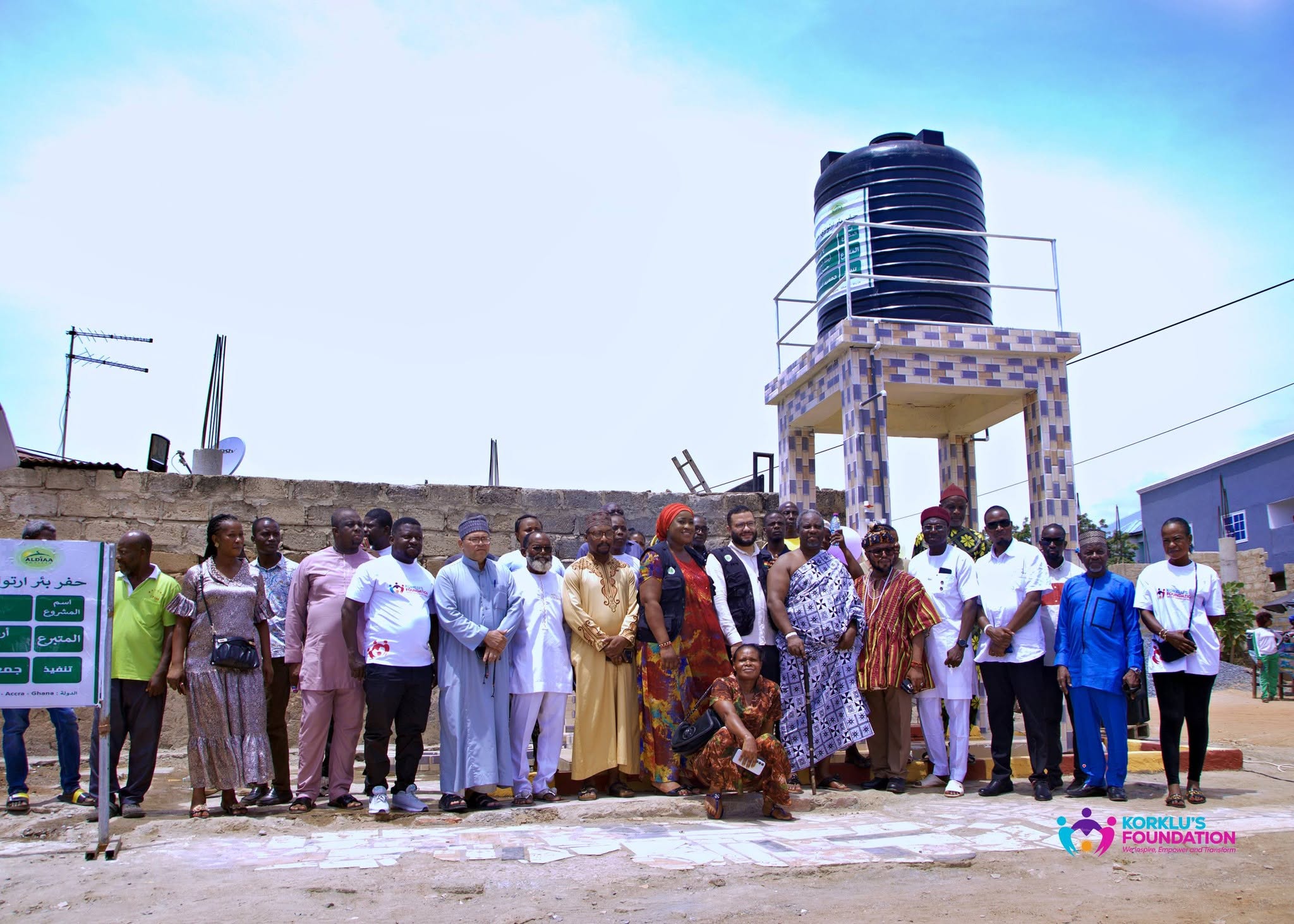 Community members gather beside the completed Odikoman borehole